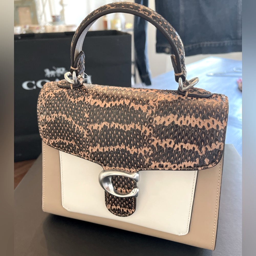 Coach handbag with tags, shoulder and original box.